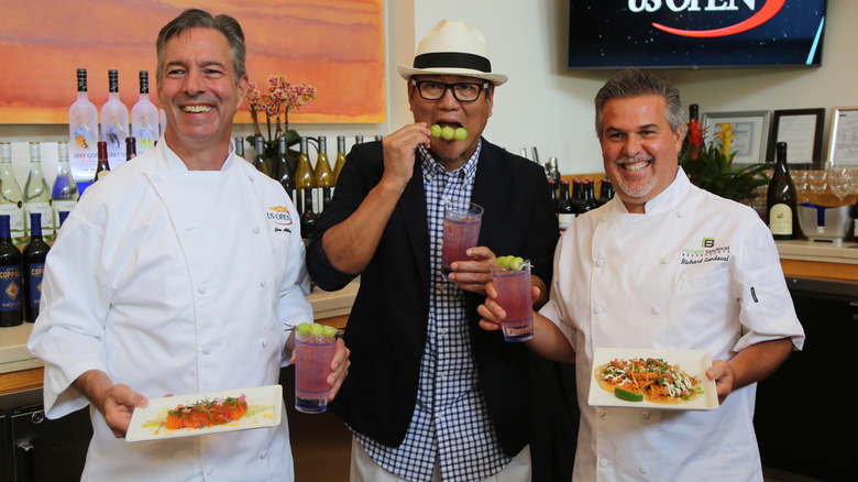 Iron Chef Morimoto eats olives with other chefs