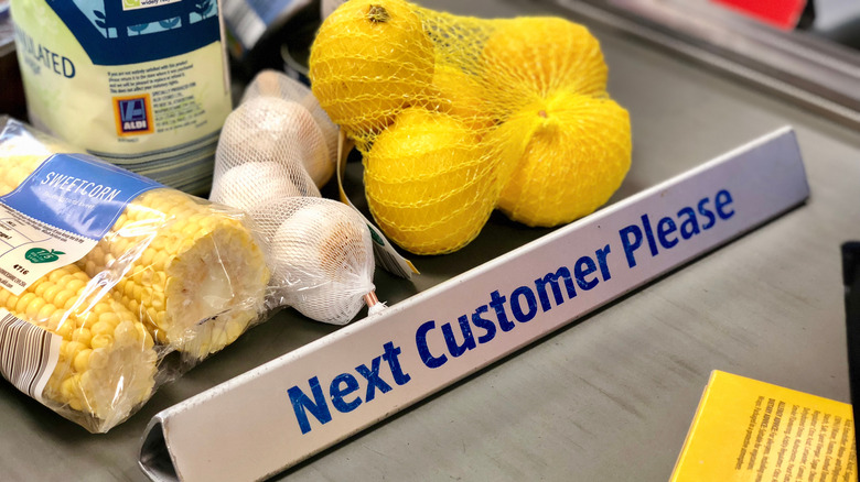 Food on Aldi checkout conveyor belt