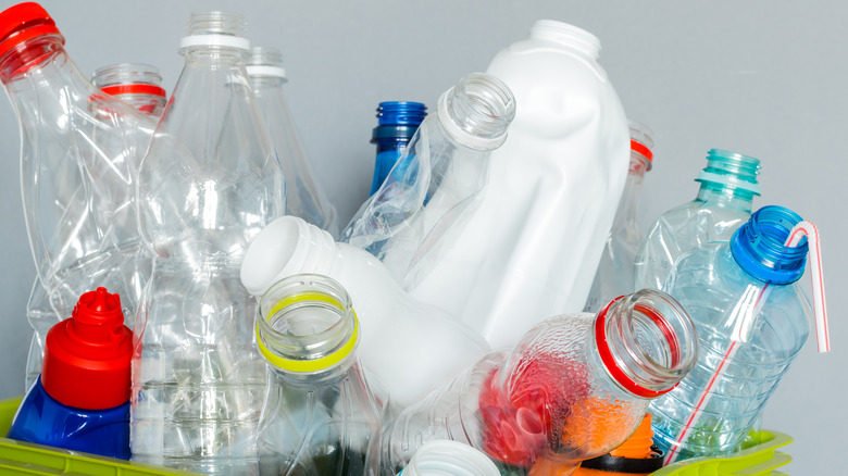 Bottled plastics in a bin