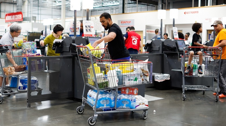 Costco shoppers checking out