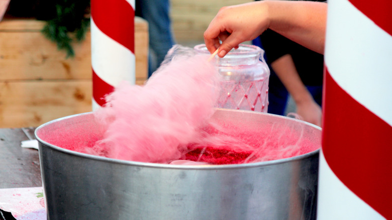 Person making cotton candy