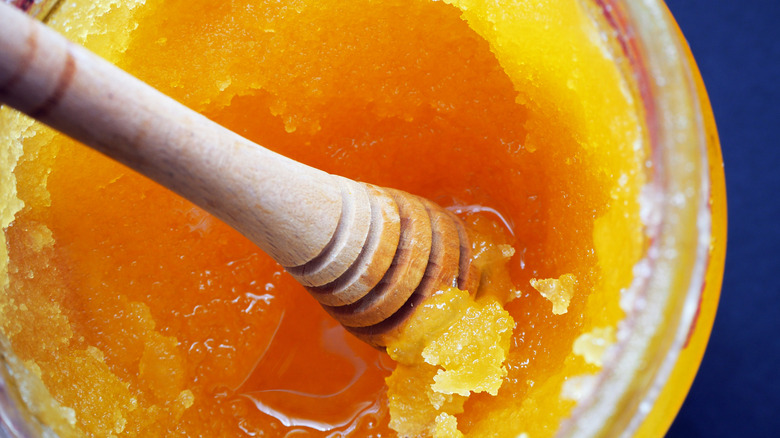 Crystallized honey on a dipper