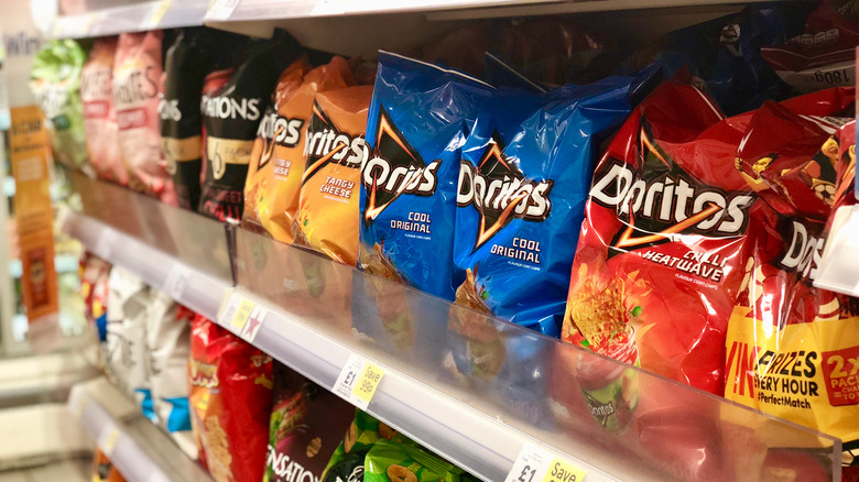 A line of Doritos chips on a store shelf