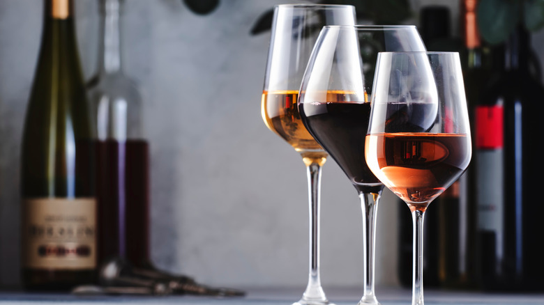 Three filled wine glasses 