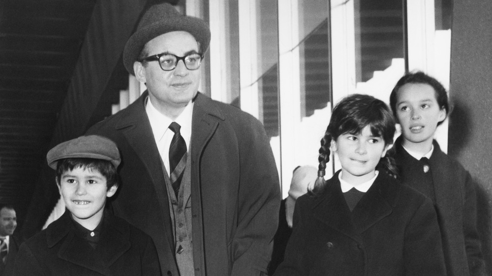 Dino De Laurentiis and three of his children in black-and-white image
