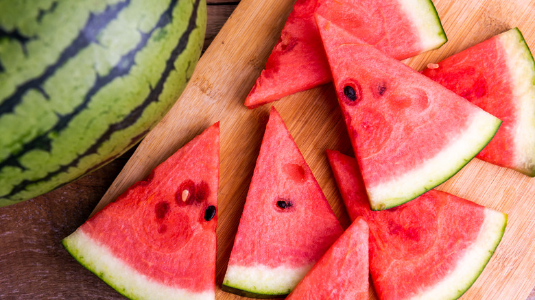 Slices of watermelon on cutting board