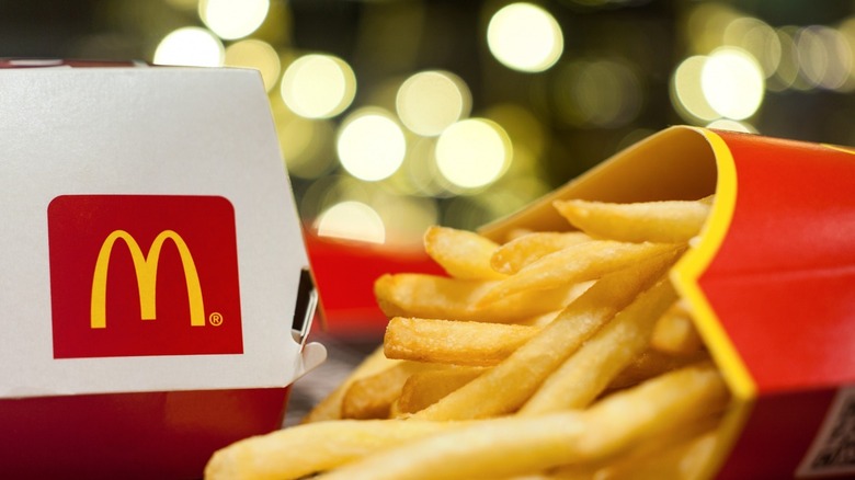 McDonald's fries and burger box on table