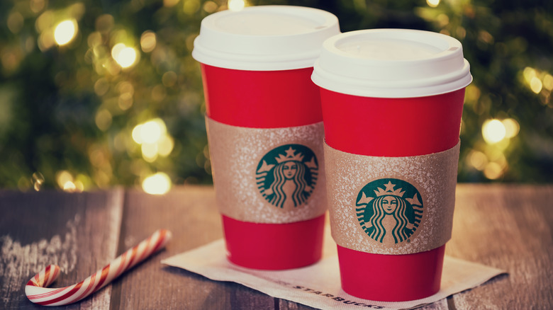 Starbucks holiday cups and candy cane