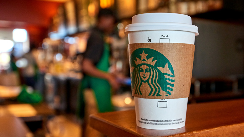 Starbucks cup on a counter