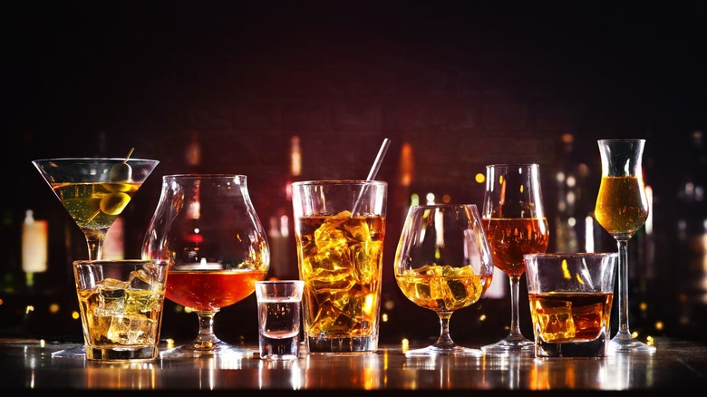 Drinks in glasses in a dark bar