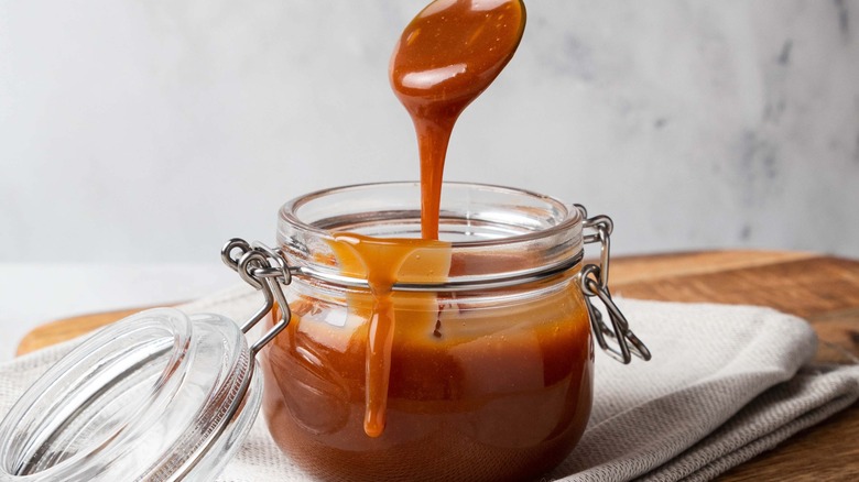 A jar of caramel sauce