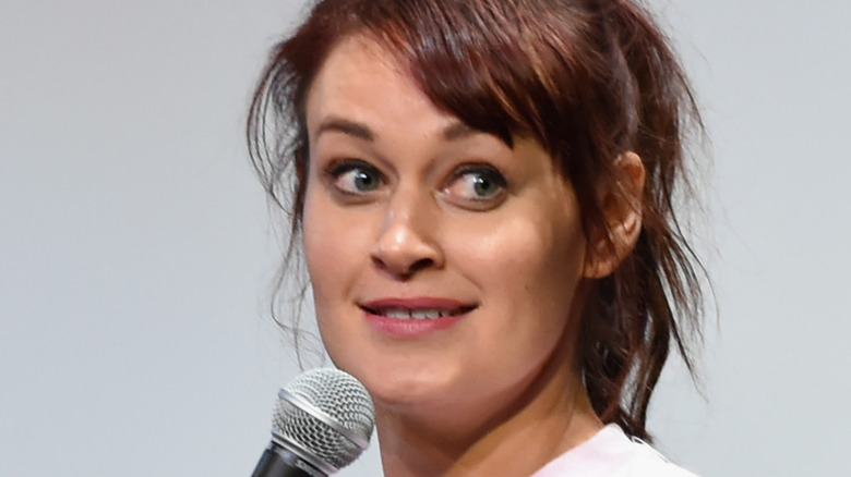 Mamrie Hart smiling over microphone