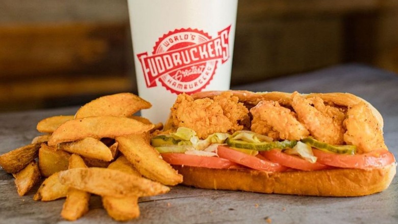 Fuddrucker's sandwich fries and drink