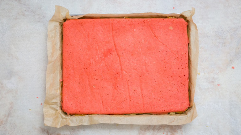 flat red cake on sheet pan