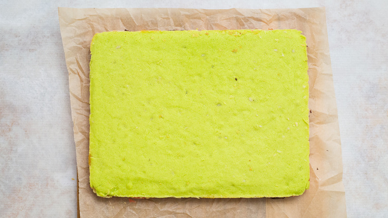 flat green cake on table