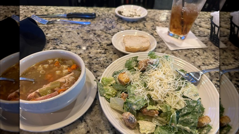 Carrabba's lunch deal with unlimited soup, salad, and bread on table.
