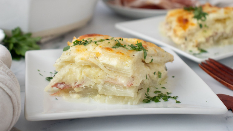 Scalloped potato serving on plate