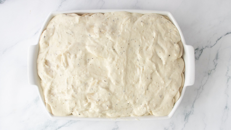 Casserole topped with creamy sauce