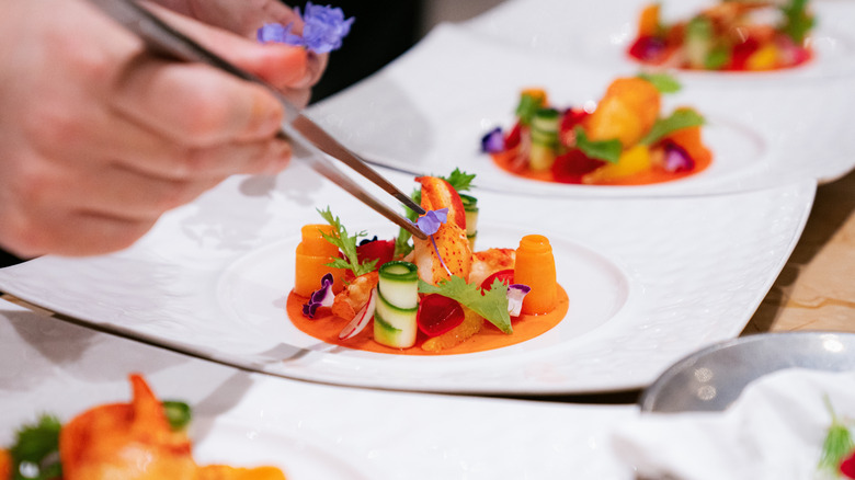 Chef plating a gourmet dish