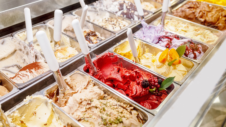 Spoons sticking into flavors of gelato