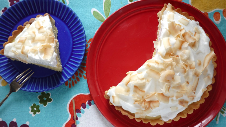 Coconut cream pie with a slice taken out