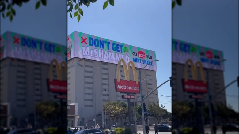 Large billboard next to McDonald's