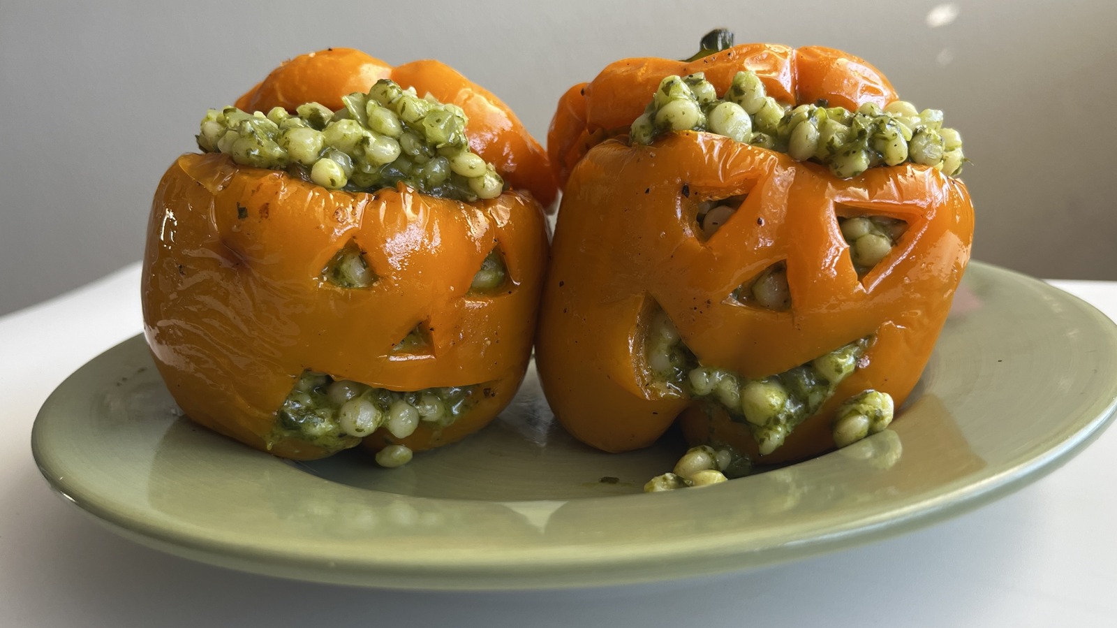 Jack-O-Lantern Couscous-Stuffed Peppers Recipe