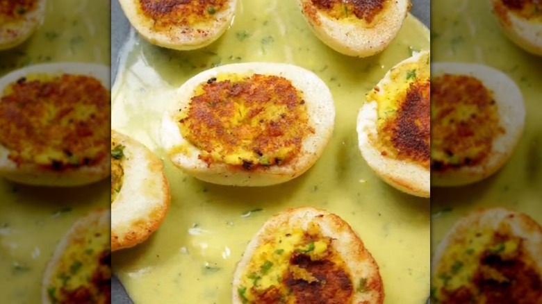 Eggs Jeannette served with a Dijon mustard sauce