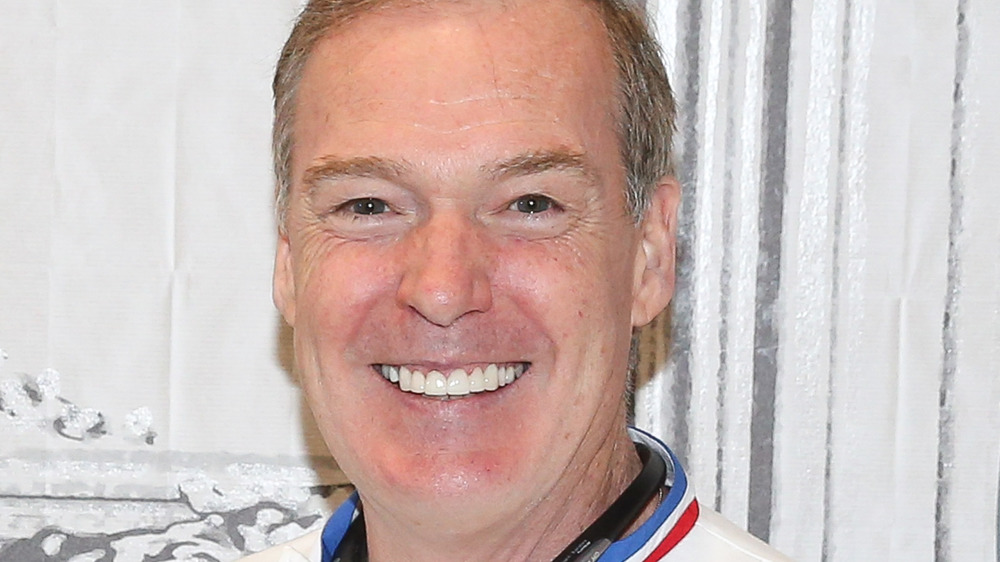 Jacques Torres smiling at event