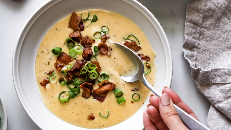 jalapeno beer cheese soup with green onions and bacon