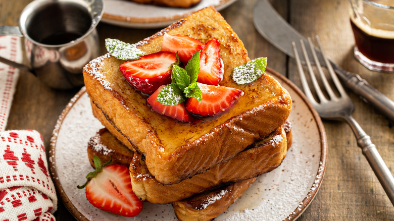French toast stack with fresh herbs and strawberries