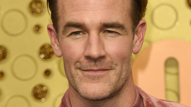 James Van Der Beek smiling at event