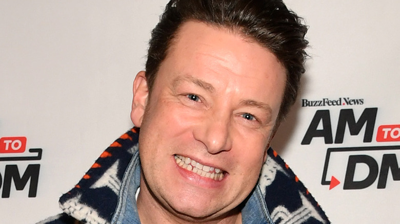 Jamie Oliver in denim smiling