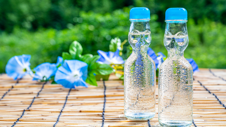 Soda bottles and flowers