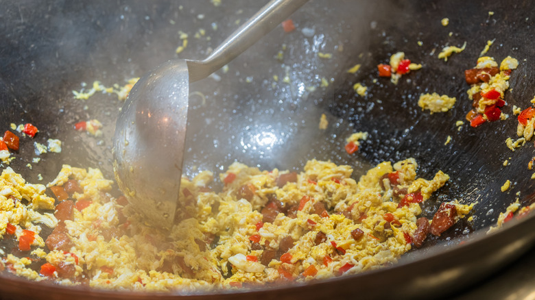 Ingredients being cooked in a wok