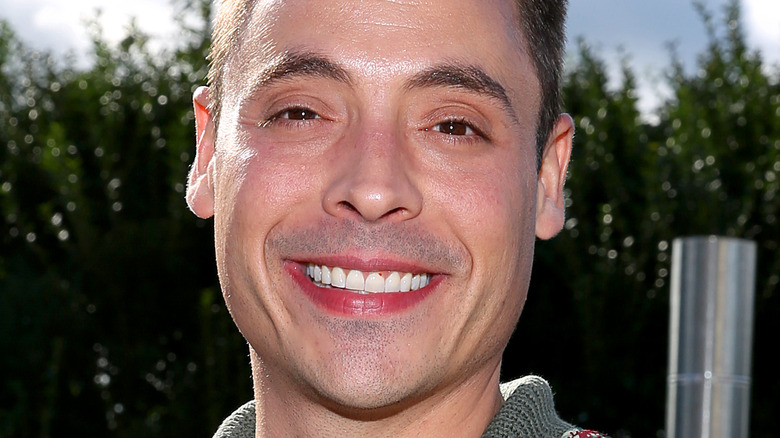 Jeff Mauro smiling at an event