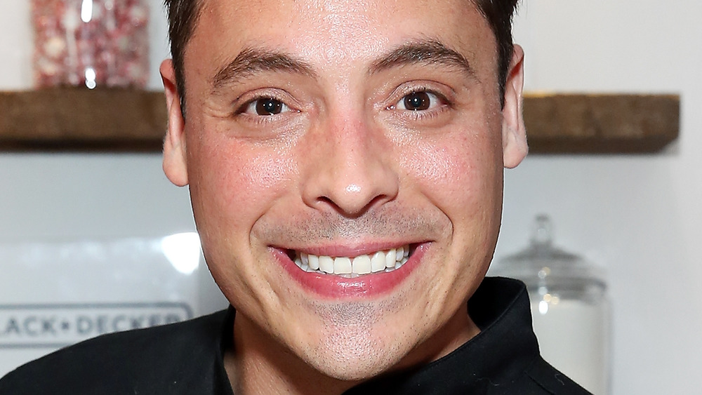 Jeff Mauro's smiling wide