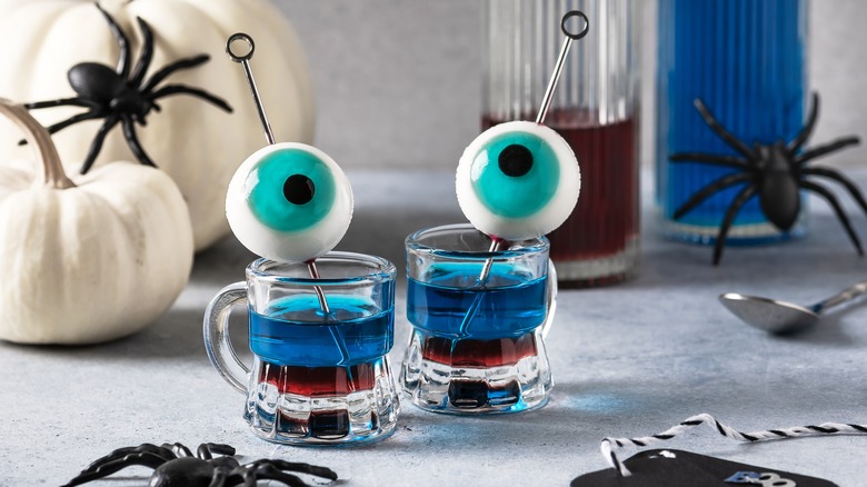 Halloween Jell-O shots with blue eyeballs