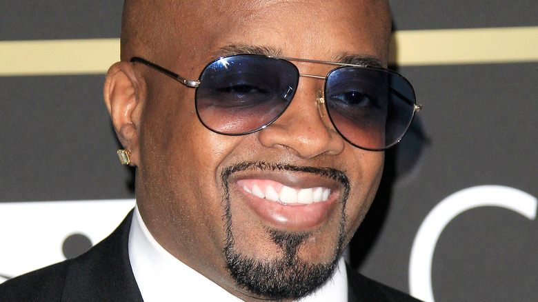 Jermaine Dupri in suit and sunglasses