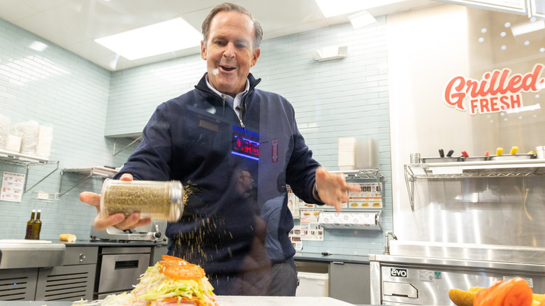 Peter Cancro making a Jersey Mike's sandwich.