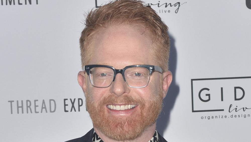 Headshot of Jesse Tyler Ferguson with glasses