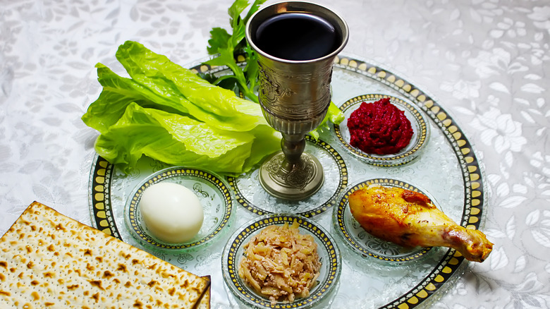 Passover seder plate with matzo and wine