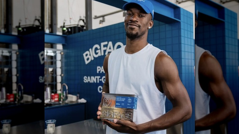 Jimmy Butler posing with Bigface coffee at pop-up event
