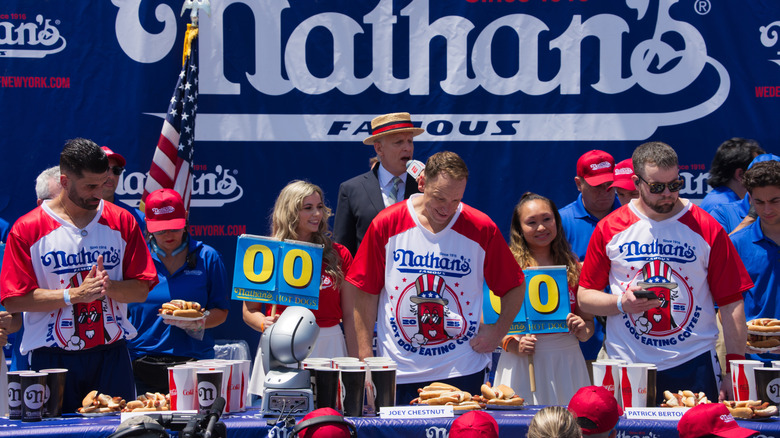 Joey Chestnut and other contestants prepare to battle in the Nathan's Hot Dog Eating Contest