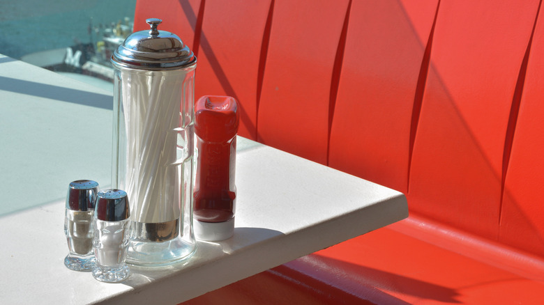 Johnny Rockets booth with condiments