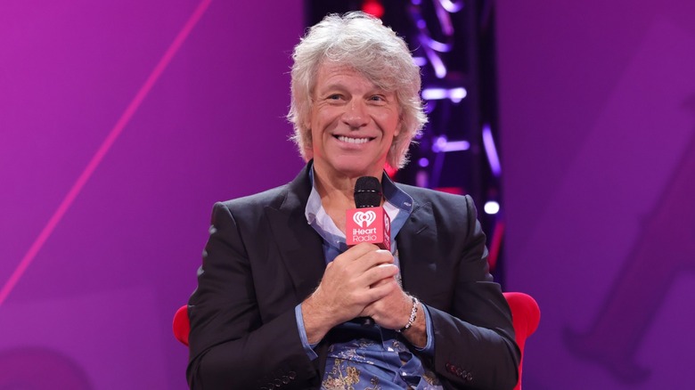 Jon Bon Jovi speaks onstage at a live event