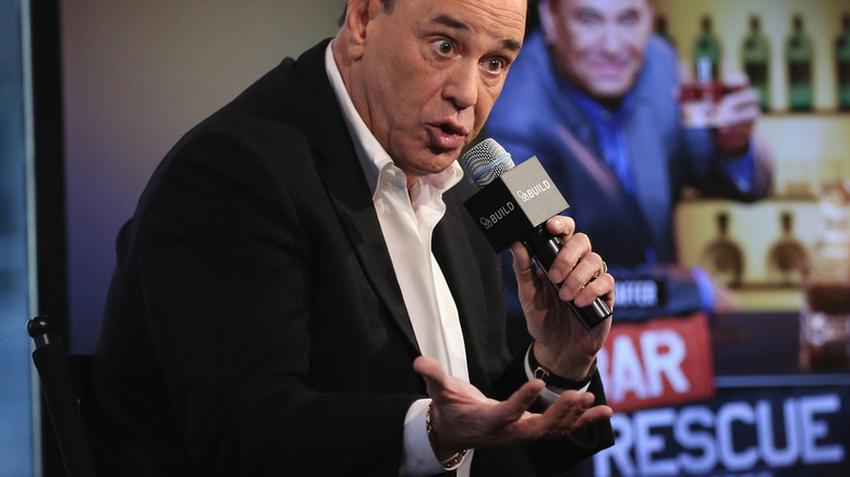 Jon Taffer speaking into a microphone