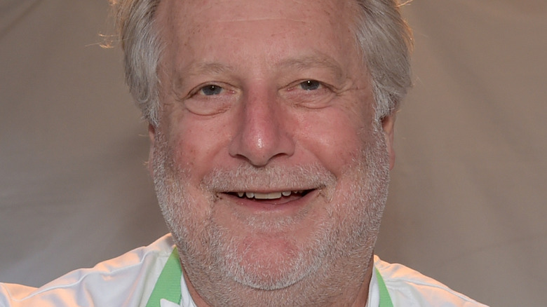 Jonathan Waxman holding taco