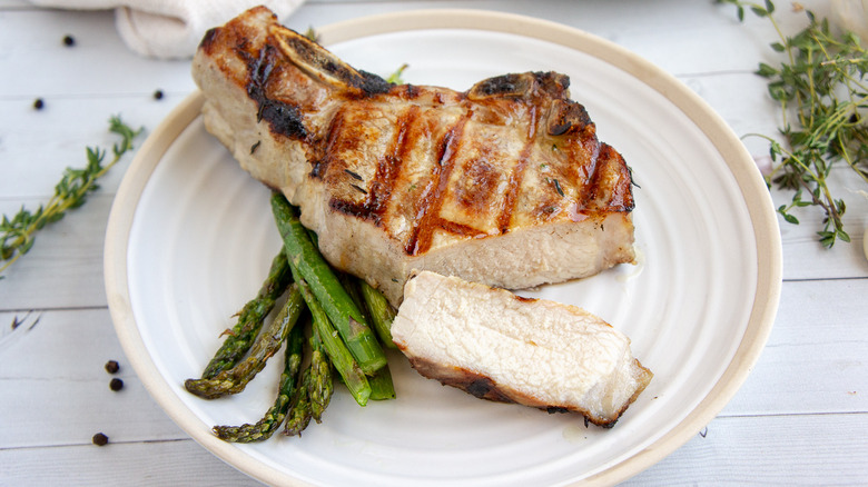 grilled pork chop plated
