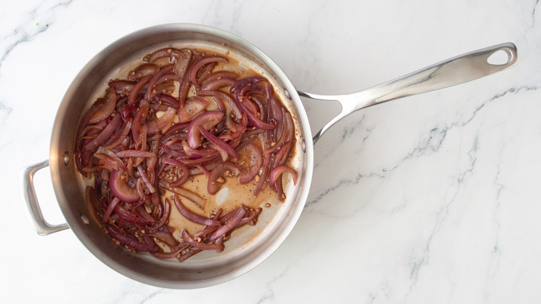 Red wine onions in saucepan